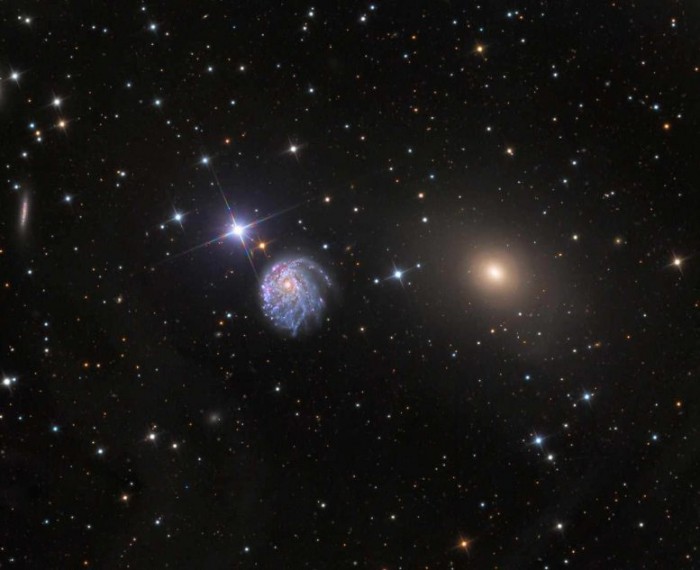 哈勃望远镜拍摄的壮观图像显示了一个奇怪扭曲的螺旋星系